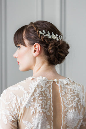 Bride wearing a silver leaf bridal hair comb