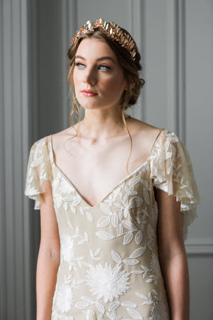 Bride wearing a rose gold laurel leaf tiara
