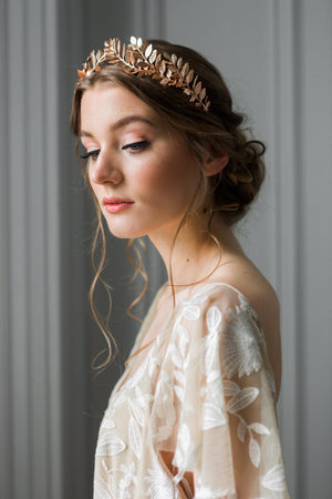 Bride wearing a gold laurel leaf tiara