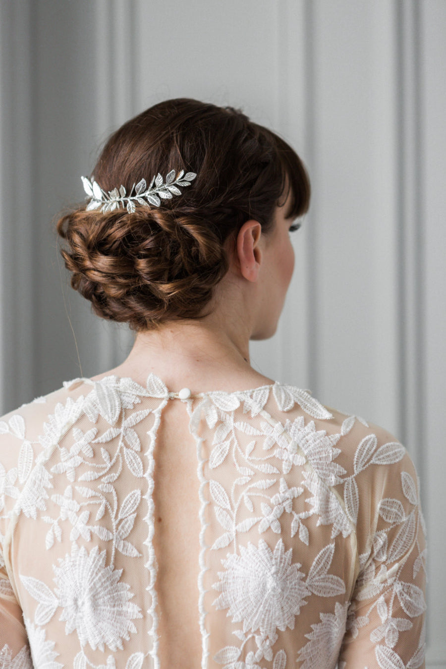 Bride wearring a silver laurel leaf comb in her hair