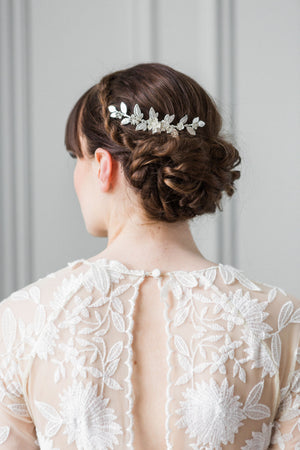 Bride wearing a silver leaf bridal comb in her hair