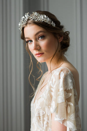 Bride wearing a silver laurel leaf tiara