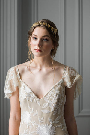 Bride wearing a gold leaf bridal tiara