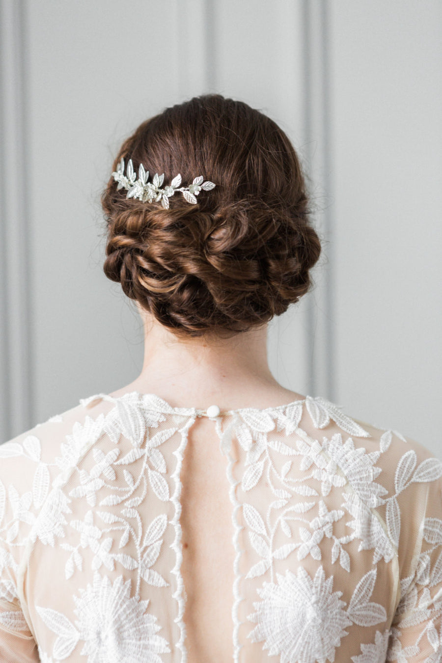 Bride wearing a silver leaf bridal hair comb