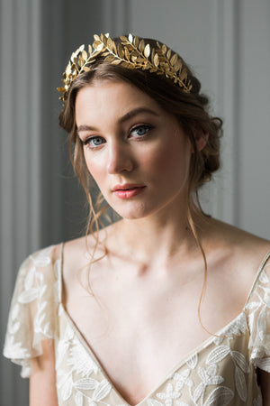 Bride wearing a gold laurel leaf tiara