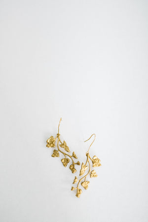 Earrings made of gold leaves and flowers
