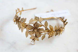 Close up of a gold leaf tiara